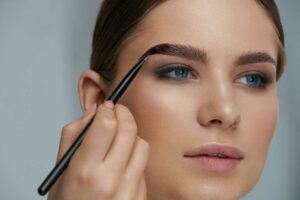 Woman having her eyebrows tinted