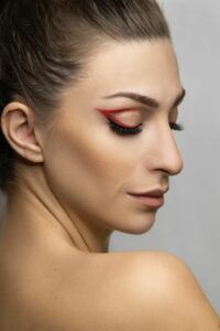 woman with red eye shadow