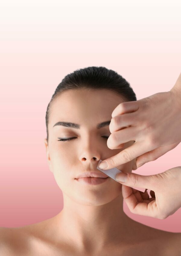 Woman getting facial waxing and tinting