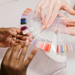 A woman testing nail colors