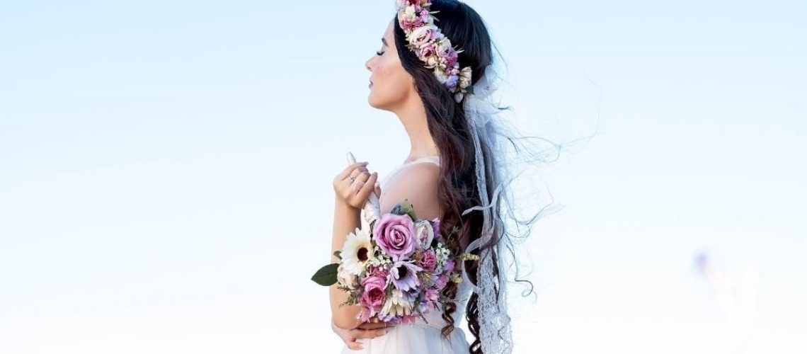 a bride holding a bouquet