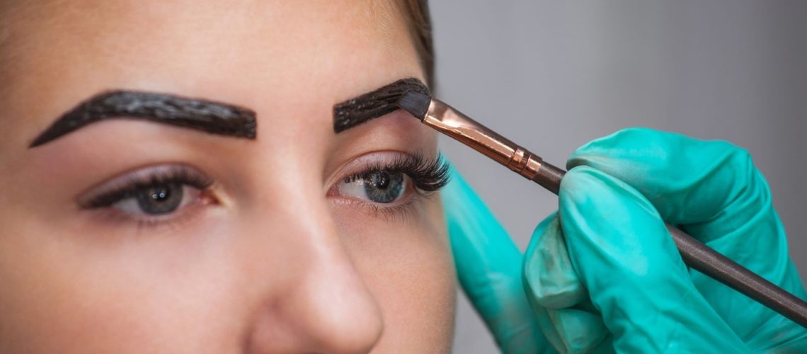 henna being added to eyebrows