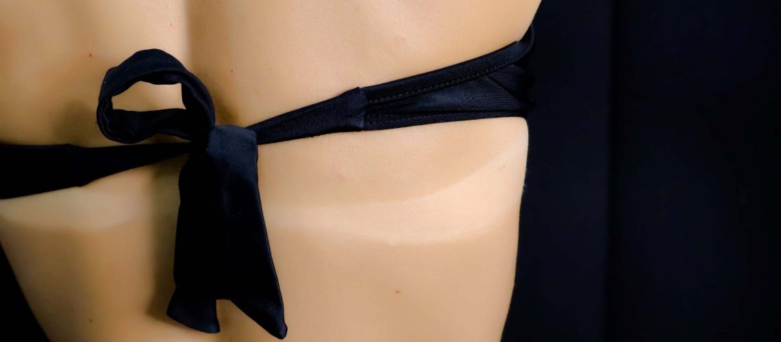 Tan lines on woman's back