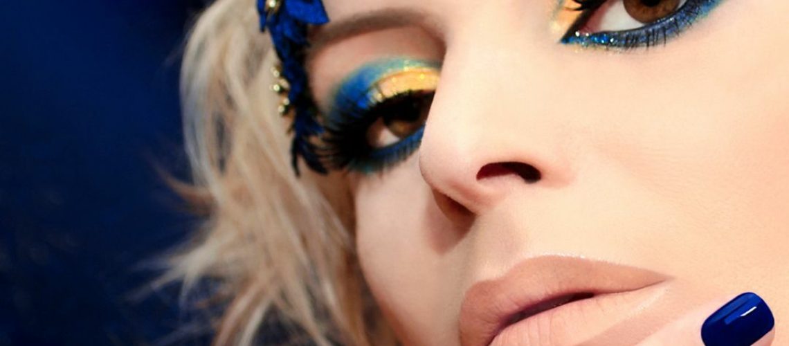 Woman with blue flower makeup