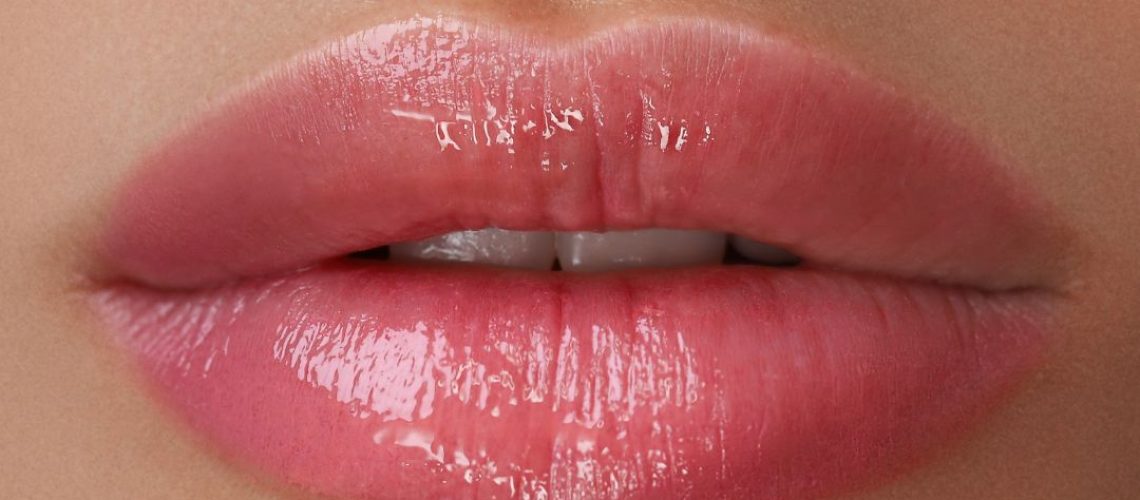 Close up of lips with lip gloss