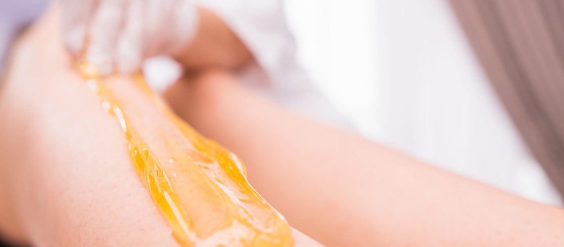 Cropped,Photo,Of,Waxing,Epilation,Procedure,For,Removing,Hair,With